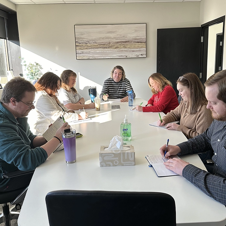 group of people in a conference room