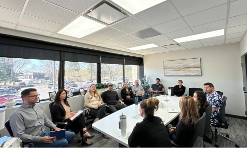 goup of people meeting in a conference room