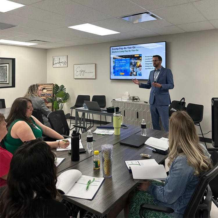 person doing presentation to group of people