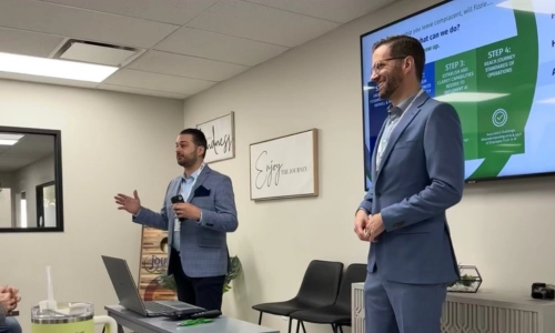 two people speaking in a meeting